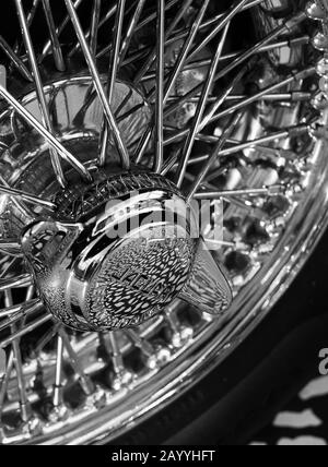 Close up of wheel on a Jaguar E-Type Zero car exhibited at the Victoria and Albert Museum exhibition entitled Cars: Accelerating the Modern World. Stock Photo