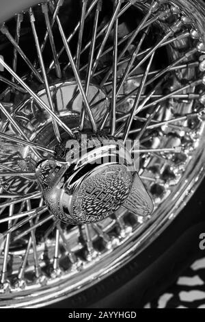 Close up of wheel on a Jaguar E-Type Zero car exhibited at the Victoria and Albert Museum exhibition entitled Cars: Accelerating the Modern World. Stock Photo