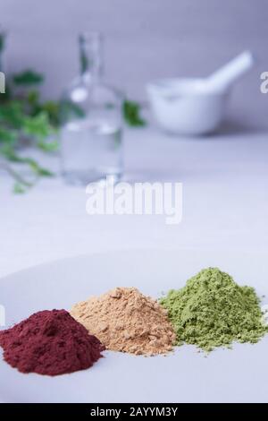 Ayurvedic powders are mainly used mainly for haircare and the confection of luxurious no-poo and solid shampoos. Stock Photo