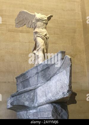 The Winged Victory of Samothrace, also called the Nike of Samothrace, is a marble Hellenistic sculpture of Nike. Stock Photo