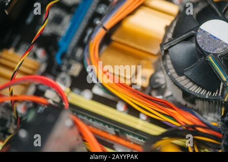 Cooler on computer graphics card. Dust-covered parts of system block. old graphics card. Stock Photo