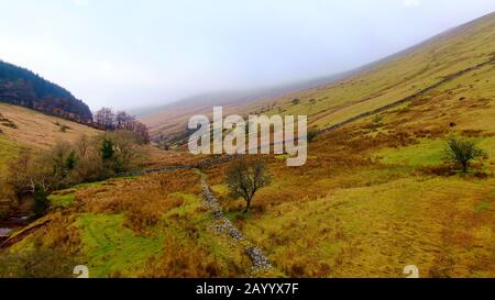 Flight over Brecon Beacons National Park in Wales - aerial view Stock Photo