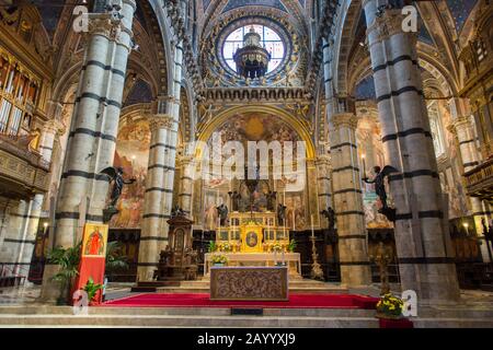 View of the altar in the Siena Cathedral di Santa Maria, better known as the Duomo, in Siena, Tuscany, Italy. Stock Photo