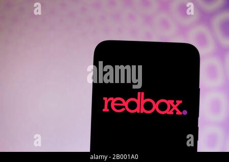 In this photo illustration the Redbox Automated Retail LLC logo seen ...