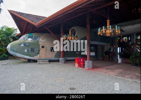 A retired Fairchild C-123 Provider (an American military transport aircraft) is being used in the design of a restaurant in Quepos in Costa Rica. Stock Photo