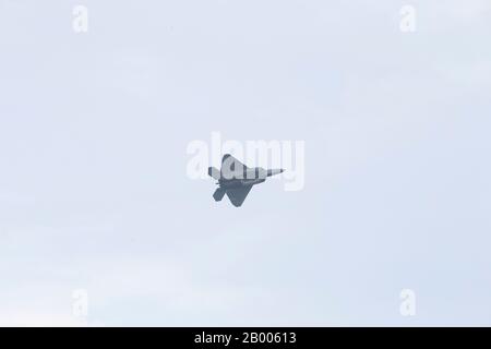 A U.S. Air Force F-22 Raptor with the 154th Wing Hawaii Air National Guard conducts an aerial demonstration during the Singapore Airshow 2020 near Changi Exhibition Center, Republic of Singapore, Feb. 11, 2020. The U.S. and Singapore have maintained a mutual partnership for more than 50 years that allows both countries to benefit off of each other’s resources and defense technologies. (U.S. Marine Corps photo by Lance Cpl. Madeline Jones) Stock Photo