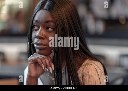 Dark skinned young woman, portrait, Duesseldorf, Germany Stock Photo