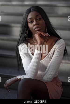Dark-skinned young woman, portrait, Duesseldorf, Germany Stock Photo