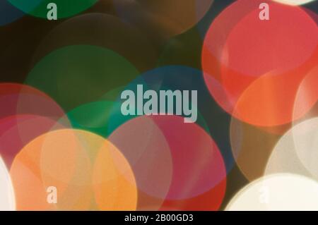 Colourful festive multi-colored circles . Defocused abstract multicolored bokeh lights background Stock Photo