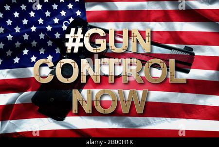 Hashtag gun control now slogan and The pistol on American flag background Stock Photo