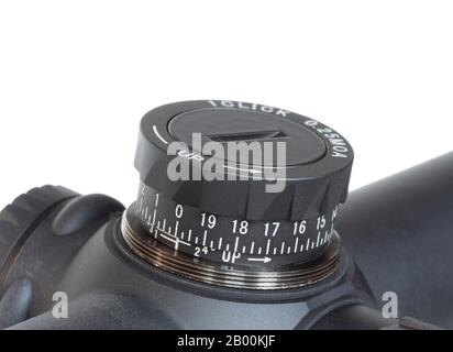 Elevation dial on a rifle scope that is isolated on white Stock Photo