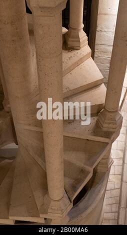 A spiral stairway in the Hall of the Guards, Conciergerie, Paris, France Stock Photo