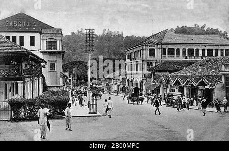 Sri Lanka: Ward Street, Kandy, in the early 20th century.  Kandy is a city in the centre of Sri Lanka. It was the last capital of the ancient kings' era of Sri Lanka. The city lies in the midst of hills in the Kandy plateau, which crosses an area of tropical plantations, mainly tea. Kandy is one of the most scenic cities in Sri Lanka; it is both an administrative and religious city. It is the capital of the Central Province (which encompasses the districts of Kandy, Matale and Nuwara Eliya) and also of Kandy District. Stock Photo