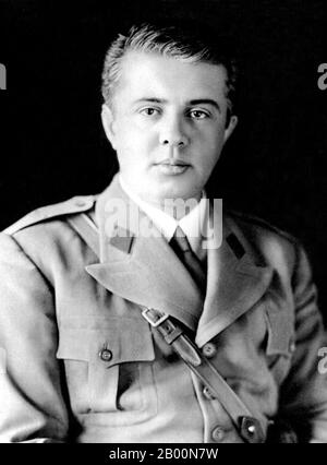 Albania: Official portrait of Enver Hoxha (1908-85) as a young military officer.  Enver Halil Hoxha (16 October 1908 – 11 April 1985) was the leader of Albania from the end of World War II until his death in 1985, as the First Secretary of the Party of Labour of Albania. He also served as Prime Minister of Albania from 1944 to 1954, Minister of Defense from 1944 to 1953, Minister of Foreign Affairs from 1946 to 1953, Chairman of the Democratic Front from 1945 to his death, and as Commander-in-Chief of the Albanian armed forces from 1944 to his death. Stock Photo