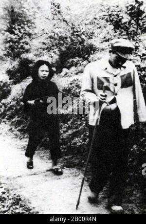 Vietnam: A female Vietnamese militia woman drives a captured Chinese PLA soldier ahead of her during the 1979 Chinese invasion of Vietnam.  A female Vietnamese militia woman drives a captured Chinese PLA soldier ahead of her during the 1979 Chinese invasion of Vietnam (the Third Indochina War). The image is strikingly (and perhaps deliberately) reminiscent of a similar photograph from the Second Indochina War showing a large American pilot being driven by a tiny Vietnamese female soldier.