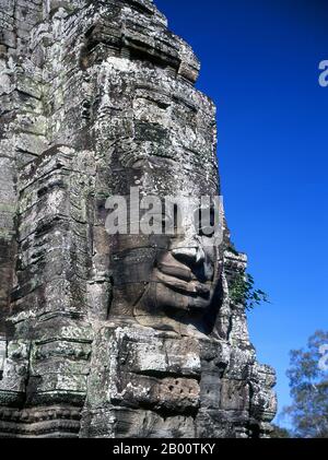 Cambodia: The face towers of the Bayon, Angkor Thom.  The Bayon was originally the official state temple of the Mahayana Buddhist King Jayavarman VII. The Bayon, at the centre of Angkor Thom (Great City), was established in the 12th century by King Jayavarman VII.  Angkor Thom, meaning ‘The Great City’, is located one mile north of Angkor Wat. It was built in the late 12th century CE by King Jayavarman VII, and covers an area of 9 km², within which are located several monuments from earlier eras as well as those established by Jayavarman and his successors. Stock Photo