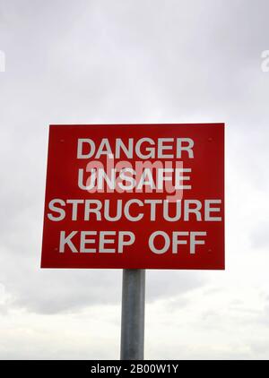 danger sign at grimsby fish docks. Unsafe structure Stock Photo