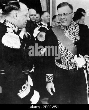 Indonesia: H.J. Van Mook, Lieutenant-Governor of the Dutch East Indies, with Rear Admiral K. Doorman, shortly before the Japanese invasion of May, 1942.  On 8 December, 1941, Netherlands declared war on Japan. On the night of 10-11 January, 1942, the Japanese attacked Menado in Sulawesi. At about the same moment they attacked Tarakan, a major oil extraction centre and port in the north east of Borneo. On 27 February, the Allied fleet was defeated in the Battle of the Java Sea. The following day, Japanese troops landed on four places along the northern coast of Java almost undisturbed. Stock Photo