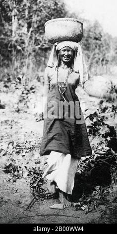 Vietnam: 1918 photo of a Cham woman from Chau Doc in the Mekong Delta, then part of Cochinchina.  Cochinchina is a region comprising the southern third of Vietnam including Saigon/Ho Chi Minh City, and was a French colony from 1862 to 1948. The later state of South Vietnam was created in 1954 by combining Cochinchina with southern Annam. The Cham people are remnants of the Kingdom of Champa (7th to 15th centuries), They are nowadays concentrated between Kampong Cham Province in Cambodia and central Vietnam's Phan Rang and southeastern Vietnam’s Phan Thiet, Ho Chi Minh City and An Giang Area. Stock Photo