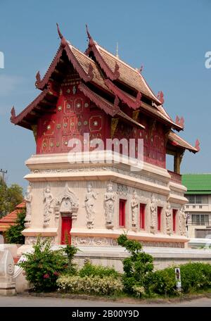 Thailand: A thewada (angel) on the mondop within the Ubosot (bot), Wat Phra Singh, Chiang Mai.  Wat Phra Singh or to give it its full name, Wat Phra Singh Woramahaviharn, was first constructed around 1345 by King Phayu, 5th king of the Mangrai Dynasty.  King Mengrai founded the city of Chiang Mai (meaning 'new city') in 1296, and it succeeded Chiang Rai as capital of the Lanna kingdom. Chiang Mai sometimes written as 'Chiengmai' or 'Chiangmai', is the largest and most culturally significant city in northern Thailand. Stock Photo