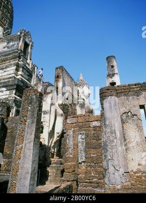 Thailand: Buddha, Wat Phra Si Rattana Mahathat Chaliang, Si Satchanalai Historical Park.  Si Satchanalai was built between the 13th and 15th centuries and was an integral part of the Sukhothai Kingdom. It was usually administered by family members of the Kings of Sukhothai. Stock Photo