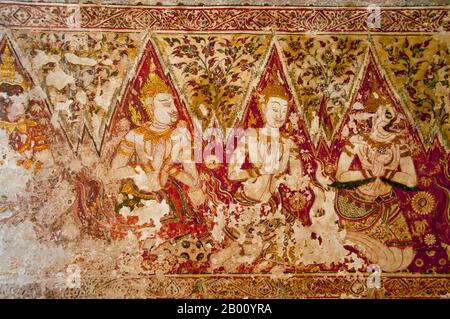 Thailand: Mural in the main viharn, Wat Yai Suwannaram, Phetchaburi.  Wat Yai Suwannaram dates from the 17th century Ayutthaya period. The murals display celestial beings. Stock Photo