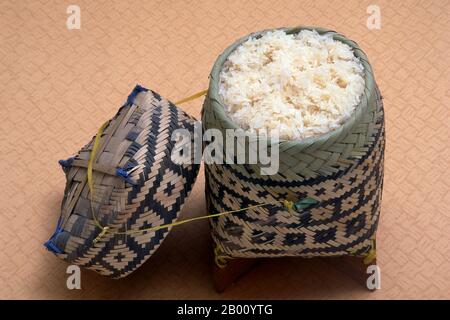 Thailand: A traditional sticky rice container.  Traditional sticky rice baskets are used all across Southeast Asia, but especially in Laos and Thailand.  Glutinous rice (Oryza sativa var. glutinosa or Oryza glutinosa; also called sticky rice, sweet rice, waxy rice, botan rice, biroin chal, mochi rice, and pearl rice) is a type of short-grained Asian rice that is especially sticky when cooked. Stock Photo