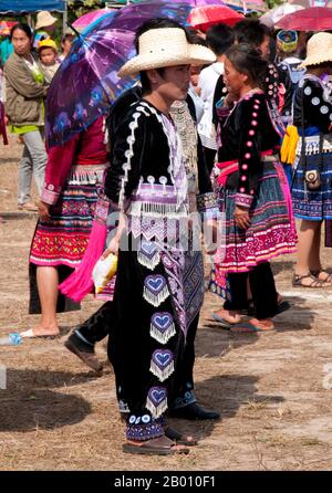 Thailand: Hmong man in his finest clothes, Hmong New Year celebrations, Chiang Mai, Northern Thailand.  Hmong New Year generally takes place in either November or December (traditionally at the end of the harvest season).  The Hmong are an Asian ethnic group from the mountainous regions of China, Vietnam, Laos, and Thailand. Hmong are also one of the sub-groups of the Miao ethnicity in southern China. Hmong groups began a gradual southward migration in the 18th century due to political unrest and to find more arable land. Stock Photo