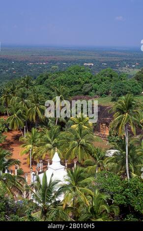 Sri Lanka: Ambasthala (Mango tree) Dagoba, Mihintale.  Mihintale is a mountain peak near Anuradhapura that is believed by Sri Lankans to be the site of a meeting between the Buddhist monk Mahinda and King Devanampiyatissa which inaugurated the presence of Buddhism in Sri Lanka. It is now a pilgrimage site, and the site of several religious monuments and abandoned structures. Stock Photo