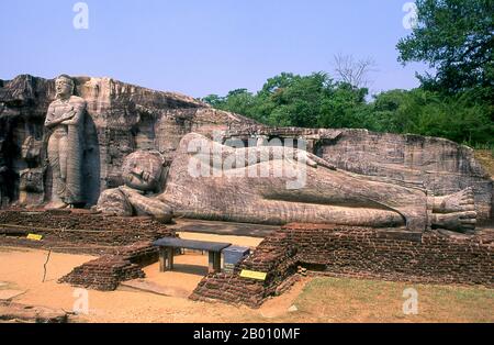 Sri Lanka: Standing and reclining Buddha at Gal Vihara, Polonnaruwa.  Gal Vihara, a Buddhist rock temple, was constructed in the 12th century by King Parakramabahu I (1123 - 1186).  Polonnaruwa, the second most ancient of Sri Lanka's kingdoms, was first declared the capital city by King Vijayabahu I, who defeated the Chola invaders in 1070 CE to reunite the country under a national  leader. Stock Photo