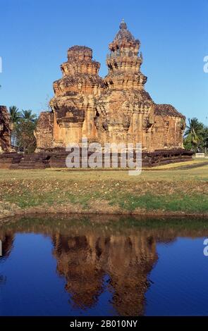 Thailand: The brick prangs of Prasat Sikhoraphum, Surin Province, Northeast Thailand.  Prasat Sikhoraphum is a Khmer Hindu temple built in the 12th century by King Suryavarman II (r. 1113 - 1150).  Prasat Sikhoraphum dates from the early 12th century and has been beautifully restored. It consists of five brick prangs on a square laterite platform surrounded by lily-filled ponds. The lintel and pillars of the central prang are beautifully carved with heavenly dancing girls, or apsara, and other scenes from Hindu mythology. Stock Photo