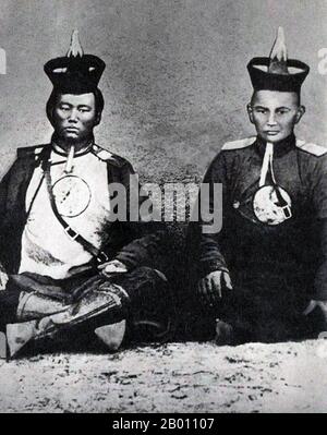 Mongolia: Damdin Sukhbaatar (left, 1893-1923) while serving in the army of the Mongolian Bogd Khan. Urga (Ulan Batyaar) 1916.  Damdin Sukhbaatar (February 2, 1893 - February 20, 1923) was a Mongolian military leader in the 1921 revolution. He is remembered as one of the most important figures in Mongolia's struggle for independence. Stock Photo