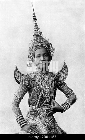 Male Thai dancers in traditional costume in an open-air performance of ...