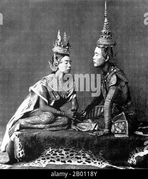 Thailand: Two actors enact the farewell scene from the Siamese play ‘I Nao’, c. 1900.   The Siamese were avid theatre-goers at the turn of the 20th century. Mime, dance, plays and shadow puppetry were all very popular. Many of the stage plays involved dancers, mostly female, who adorned themselves in jewellery and exhibited lithe movements portraying beauty and flexibility, especially in bending the fingers back. The most common plays were called ‘khon’, which essentially feature scenes from the ‘Ramakien’, the Thai version of the Hindu epic ‘The Ramayana’. Stock Photo