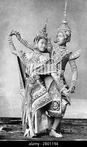 Thailand: Young dancers in a Siamese theatre, c. 1900.  The Siamese were avid theatre-goers at the turn of the 20th century and mime, dance, plays and shadow puppetry were all very popular. Many of the stage plays involved dancers, mostly female, who adorned themselves in jewellery and exhibited lithe movements portraying beauty and flexibility, especially in bending the fingers back. The most common plays were called ‘khon’, which essentially feature scenes from the ‘Ramakien’, the Thai version of the Hindu epic ‘The Ramayana’. Stock Photo