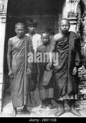 Thailand: Two Buddhist monks with a pupil and servants, late 19th century.  Nearly 95 percent of the Thai population are Theravada Buddhists, though many would argue that Siamese Buddhism has integrated with animist folk beliefs as well as Chinese religions. Thai Buddhism was based on the religious movement founded in the 6th century BCE by Siddhartha, later known as the Buddha, who urged the world to relinquish the extremes of sensuality and self-mortification and follow the enlightened Middle Way. Theravada Buddhism was made the state religion in Siam after the establishment of Sukhothai. Stock Photo