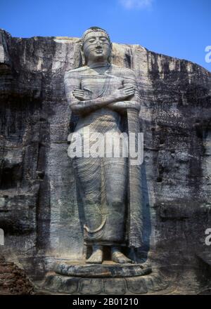 Sri Lanka: Standing Buddha at Gal Vihara, Polonnaruwa.  Gal Vihara, a Buddhist rock temple, was constructed in the 12th century by King Parakramabahu I (1123 - 1186).  Polonnaruwa, the second most ancient of Sri Lanka's kingdoms, was first declared the capital city by King Vijayabahu I, who defeated the Chola invaders in 1070 CE to reunite the country under a national  leader. Stock Photo