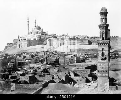 Egypt: The Saladin Citadel, Cairo (Arabic: Qala 'at Salah ad-Din). Photo by Antonio Beato (1835-1906), c. 1870-1890.  The Saladin Citadel of Cairo is a medieval Islamic fortification in Cairo, Egypt. The location, part of the Muqattam hill near the center of Cairo, was once famous for its fresh breeze and grand views of the city. It is now a preserved historic site, with mosques and museums.The Citadel was fortified by the Ayyubid ruler Salah al-Din (Saladin) between 1176 and 1183 CE, to protect it from the Crusaders. Stock Photo