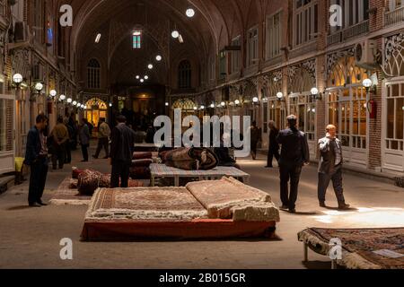 Tabriz, Iran - May 12, 2019: Great Bazaar in Tabriz with man at the carpet market, Iran. Stock Photo