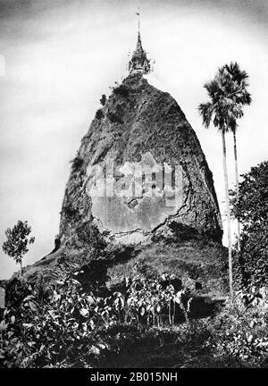 Burma/Myanmar: Papagyi Pagoda near Prome, lower Burma, c. 1920s.  Legend attributes the first Buddhist doctrine in Burma to 228 BCE when Sohn Uttar Sthavira, one of the royal monks to Emperor Ashoka the Great of India, came to the country with other monks and sacred texts. However, the era of Buddhism truly began in the 11th century after King Anawrahta of Pagan (Bagan) was converted to Theravada Buddhism. Today, 89% of the population of Burma is Theravada Buddhist.  The ancient city of Prome, renamed Pyay, is a town in Pegu (Bago) Division in lower Burma, located on the Irrawaddy (Ayeyarwady) Stock Photo
