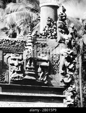 Burma/Myanmar: Woodcarvings at a Buddhist monastery in Monywa, Upper Burma, c. 1920s.  The Burmese city of Monywa is in Sagaing Division, located 136 km northwest of Mandalay on the eastern bank of the River Chindwin.  Legend attributes the first Buddhist doctrine in Burma to 228 BCE when Sohn Uttar Sthavira, one of the royal monks to Emperor Ashoka the Great of India, came to the country with other monks and sacred texts. However, the era of Buddhism truly began in the 11th century after King Anawrahta of Pagan (Bagan) was converted to Theravada Buddhism. Stock Photo