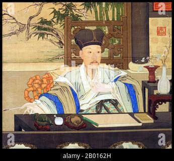 China: 'The Qianlong Emperor in his Study'. Hanging scroll painting by Giuseppe Castiglione (1688-1766), c. 1750.  The Qianlong Emperor (25 September 1711 - 7 February 1799), born Hongli and temple name Gaozong, was the fifth emperor of the Qing Dynasty. The fourth son of the Yongzheng Emperor, he reigned officially from 1735 to 1796, before abdicating in favor of his son, the Jiaqing Emperor - a filial act to not rule longer than his grandfather, the Kangxi Emperor. Despite his retirement, he retained ultimate power until his death. Stock Photo