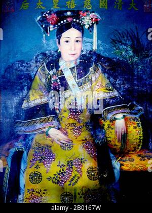 China: Empress Dowager Cixi (29 November 1835 - 15 November 1908). Oil on canvas painting by Katharine Augusta Carl (1865-1938), 1904.  Empress Dowager Cixi, personal name Xingzhen, was the concubine of the Xianfeng Emperor. Of the Manchu Yehe Nara Clan, she was a powerful and charismatic figure who became the de facto ruler of the Qing Dynasty for 47 years, from 1861 to 1908. Her son became the Tongzhi Emperor, and she ruled as regent in his stead, alongside Empress Dowager Ci'an. She consolidated her control by installing her nephew as the Guangxu Emperor after her son's death. Stock Photo