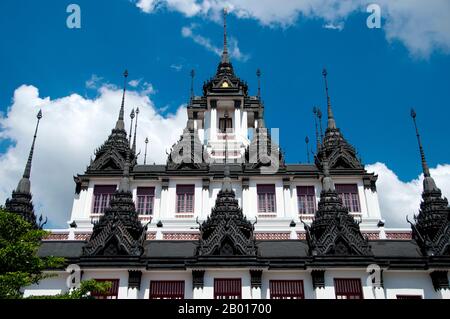 Thailand: Loha Prasad (Brazen Palace or Iron Monastery), Wat Ratchanatda, Bangkok.  Wat Ratchanaddaram was built on the orders of King Nangklao (Rama III) for Mom Chao Ying Sommanus Wattanavadi in 1846. The temple is best known for the Loha Prasada (Loha Prasat), a multi-tiered structure 36 m high and having 37 metal spires. It is only the third Loha Prasada (Brazen Palace or Iron Monastery) to be built and is modelled after the earlier ones in India and Anuradhapura, Sri Lanka. Stock Photo