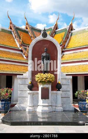 Thailand: Statue of King Ananda Mahidol (Rama VIII), Wat Suthat, Bangkok.  Phra Bat Somdet Phra Poramentharamaha Ananda Mahidol Phra Atthama Ramathibodindara, or Rama VIII,  (20 September 1925–9 June 1946) was the eighth monarch of Thailand under the House of Chakri.  Wat Suthat Thepphawararam is a royal temple of the first grade, one of six such temples in Thailand. Construction was begun by King Buddha Yodfa Chulaloke (Rama I) in 1807. Further construction and decorations were carried out by King Buddha Loetla Nabhalai (Rama II) who helped carve the wooden doors. Stock Photo