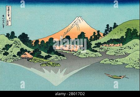 Japan: ‘Reflection of Mount Fuji in Lake Kawaguchi Seen from the Misaka Pass in Kai Province’. Ukiyo-e woodblock print from the series ‘Thirty-Six Views of Mount Fuji’ by Katsushika Hokusai (31 October 1760 - 10 May 1849), 1830.  ‘Thirty-six Views of Mount Fuji’ is an ‘ukiyo-e’ series of woodcut prints by Japanese artist Katsushika Hokusai. The series depicts Mount Fuji in differing seasons and weather conditions from a variety of places and distances. It actually consists of 46 prints created between 1826 and 1833. The first 36 were included in the original publication and 10 were added. Stock Photo