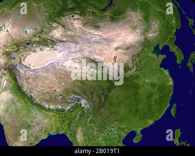 China: Composite Satellite image of China created by NASA and with contemporary frontiers superimposed in yellow, 30 March 2009.  China ranges from mostly plateaus and mountains in the west to lower lands in the east. Principal rivers flow from west to east, including the Yangtze (central), the Yellow River (Huang He, north-central), and the Amur (northeast), and sometimes toward the south (including the Pearl River, Mekong (river), and Brahmaputra), with most Chinese rivers emptying into the Pacific Ocean. Stock Photo