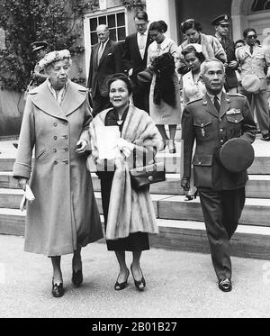 Thailand: Field Marshal Plaek Pibulsongkram (14 July  1897 - 11 June 1964), his wife Lady La-iad Bhandhukravi Pibulsongkram and Eleanor Roosevelt at Hyde Park, New York, 1955.  Pibulsongkram was one of the leaders of the military branch of the People's Party that staged a coup d'état and overthrew Thailand's absolute monarchy in 1932. In 1938, Pibulsongkram replaced Phraya Phahol as Prime Minister.  Pibulsongkram began to increase the pace of modernisation in Thailand. By manipulating the mass media, Pibulsonggram supported fascism and nationalism. Stock Photo