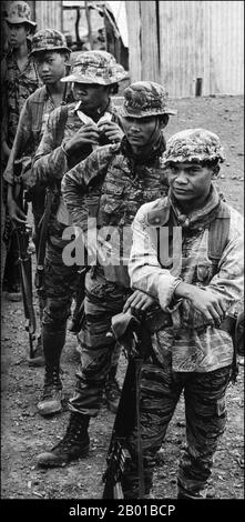 Vietnam: 'Montagnard' soldiers in the service of the Republic of Vietnam (South Vietnam) and the United States enjoyed a reputation for toughness. Duc Lap Camp, Central Highlands, 1969.  The Second Indochina War, known in America as the Vietnam War, was a Cold War era military conflict that occurred in Vietnam, Laos, and Cambodia from 1 November 1955 to the fall of Saigon on 30 April 1975. This war followed the First Indochina War and was fought between North Vietnam, supported by its communist allies, and the government of South Vietnam, supported by the U.S. and other anti-communist nations. Stock Photo