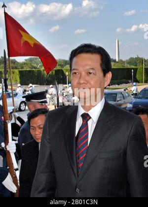 Vietnam: Nguyen Tan Dung (17 November 1949 - ), 6th Prime Minister of Vietnam (r. 2006-2016), in Washington DC. Photo by R. D. Ward (public domain), June 24 2008.  Nguyễn Tấn Dũng served as Prime Minister from 2006 to 2016. He was confirmed by the National Assembly on June 27, 2006, having been nominated by his predecessor, Phan Van Khai, who retired from office.  At a party congress in January 2011, Dung was ranked third in the hierarchy of the Communist Party of Vietnam, but was unable to maintain his post after the 12th National Congress in 2016 due to claims of corruption and nepotism. Stock Photo